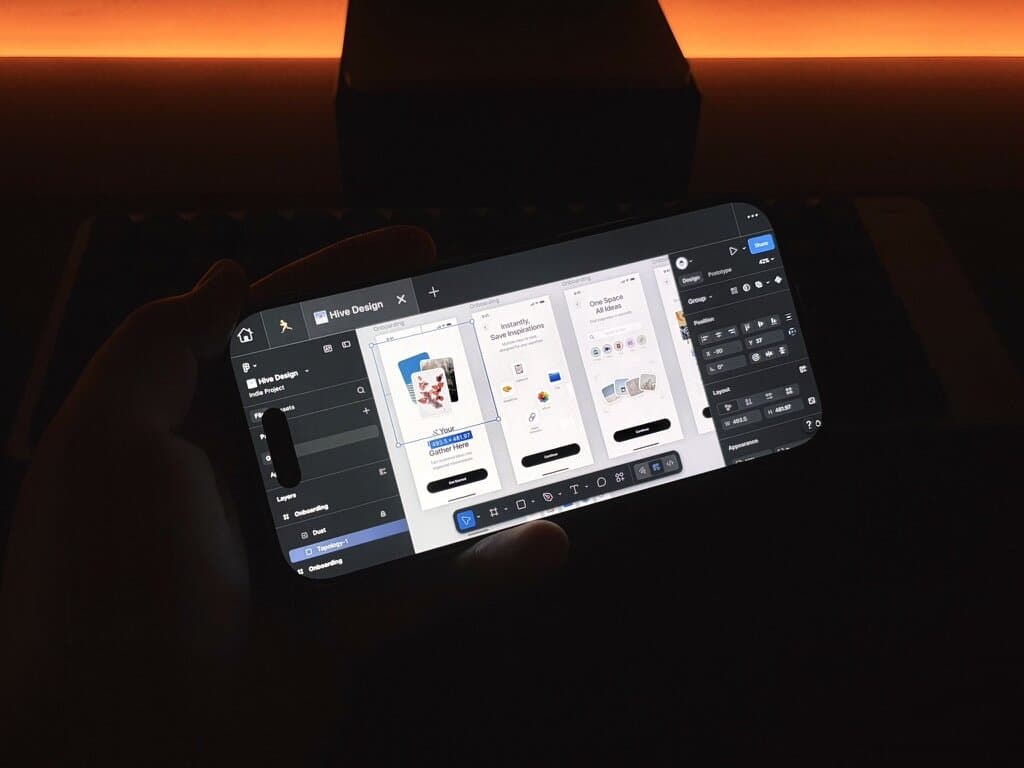 Hand holding a phone with Figgy measure overlays